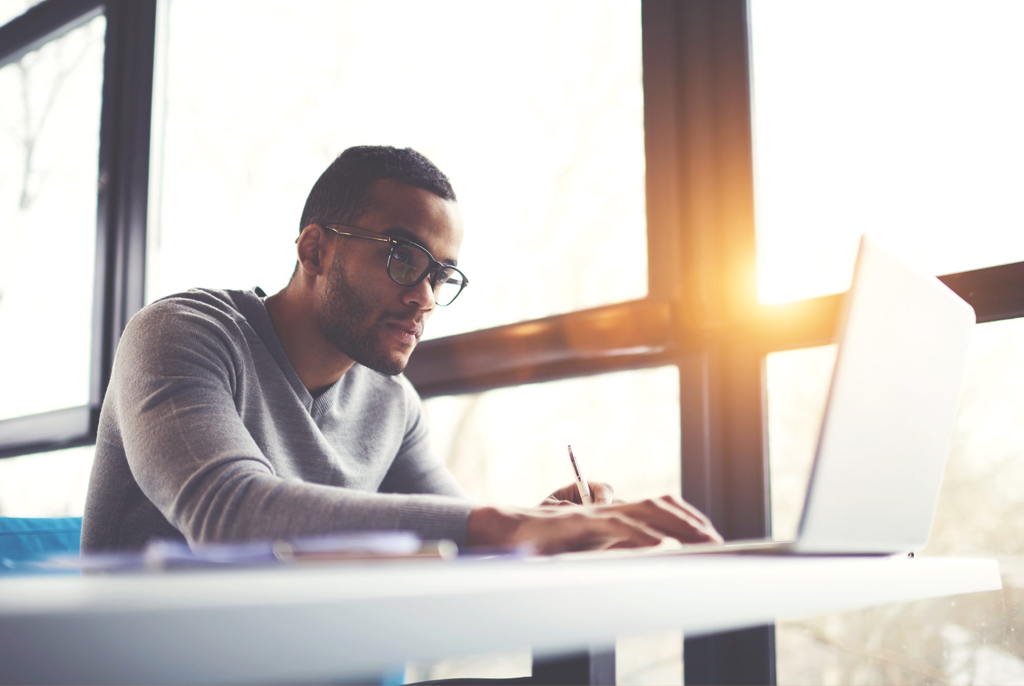 Man using laptop to check eStatements